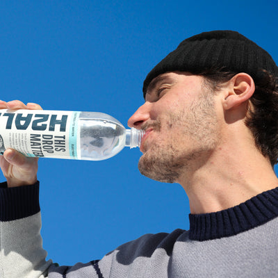 Person with an H2ALL bottle