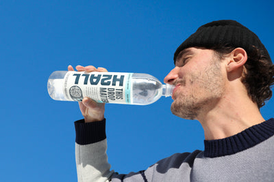 Person with an H2ALL bottle